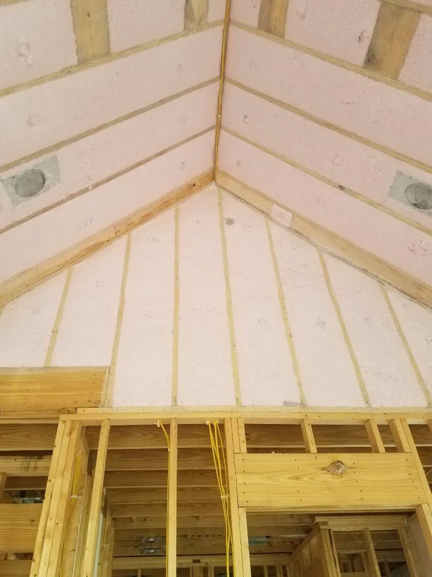 Insulated vaulted ceiling and gable end framing in a new build